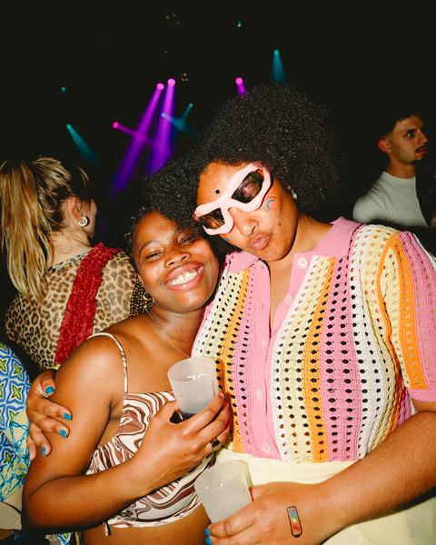 Two friends laughing on the dance floor, 16 May 2026